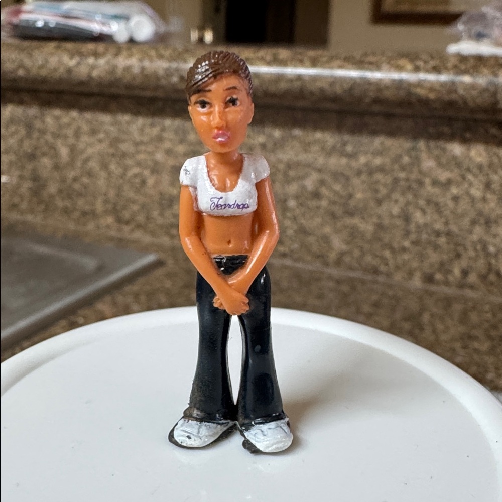 The figurine in the image is "Teardrop" from the Lil Homies Series 6 collection.